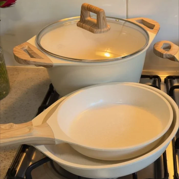 Cream Cookware Pots Set on Stove