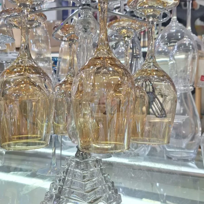 Gold Amber Crystal Wine Goblets on Rack