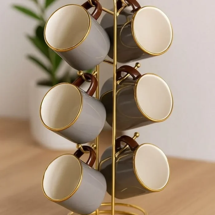 Grey and Gold Ceramic Mugs on Tree Stand