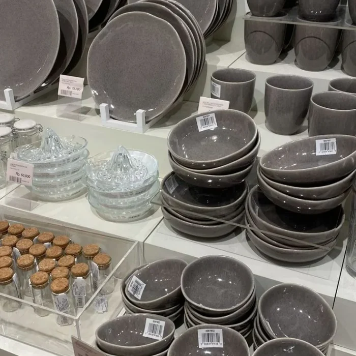 Grey Ceramic Dinnerware Display on Shelves