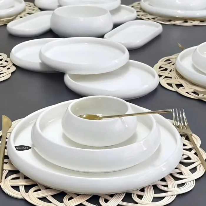 White Porcelain Dinnerware Set with Gold Cutlery